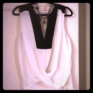 Very cute off white stylish blouse .